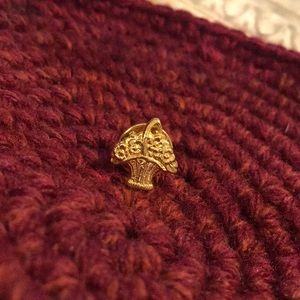 Tiny gold tone flower basket pin
